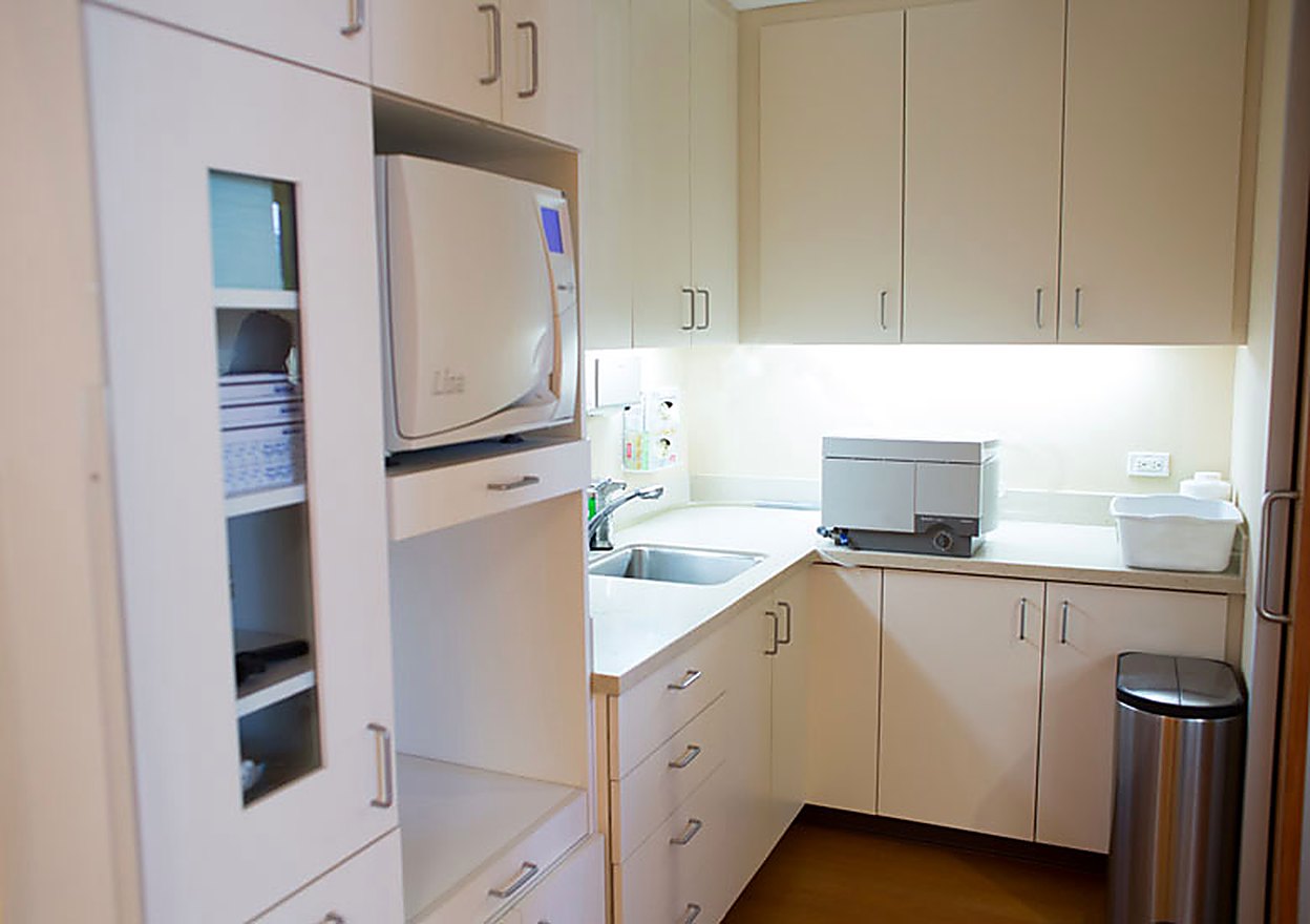 The sterilization room with hospital-grade sterilizer and sealed cassettes